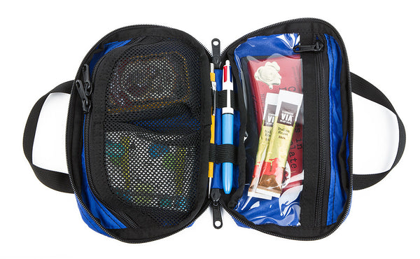 Interior shot of a filled Second Aid Pouch in Blue